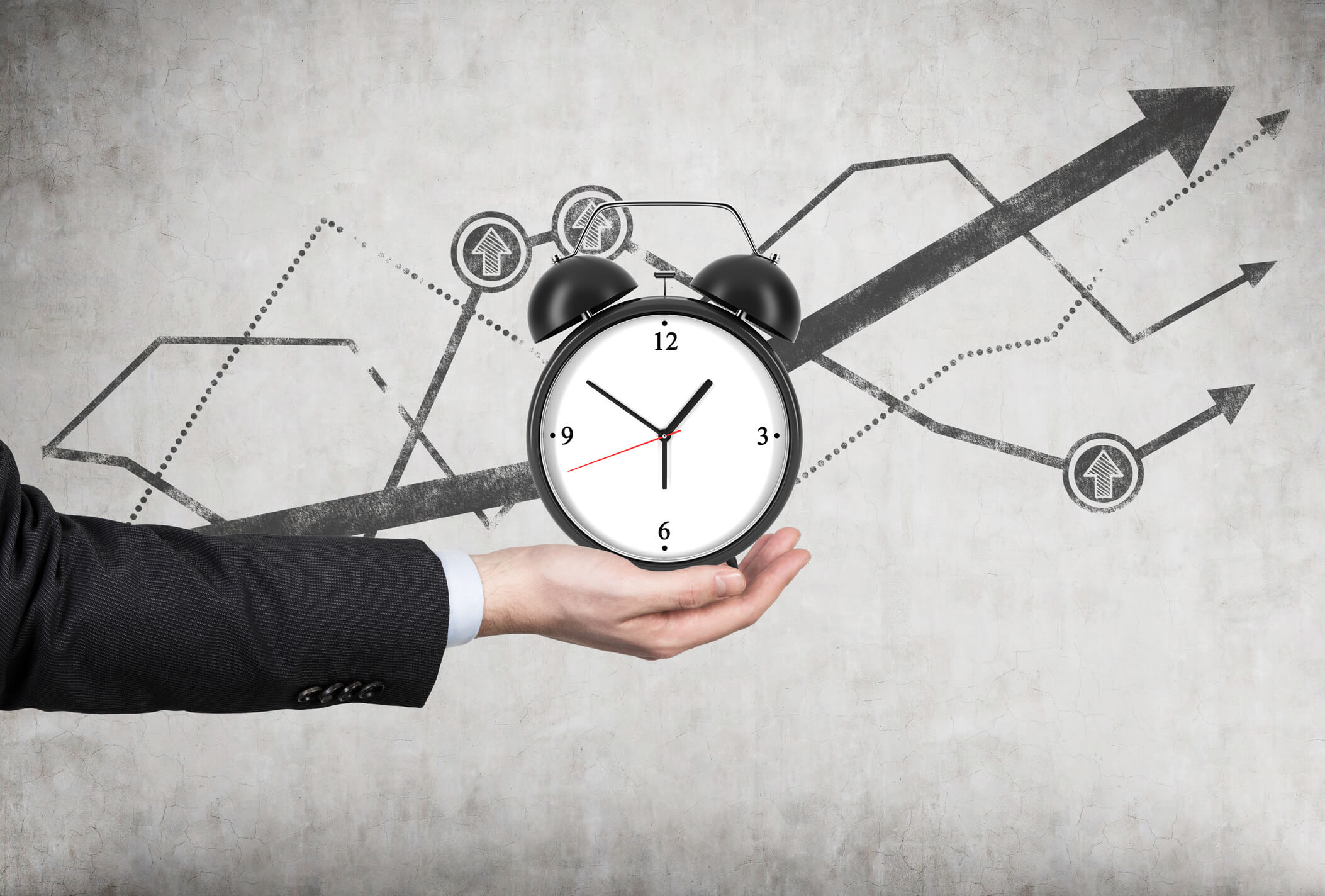 hand holding clock