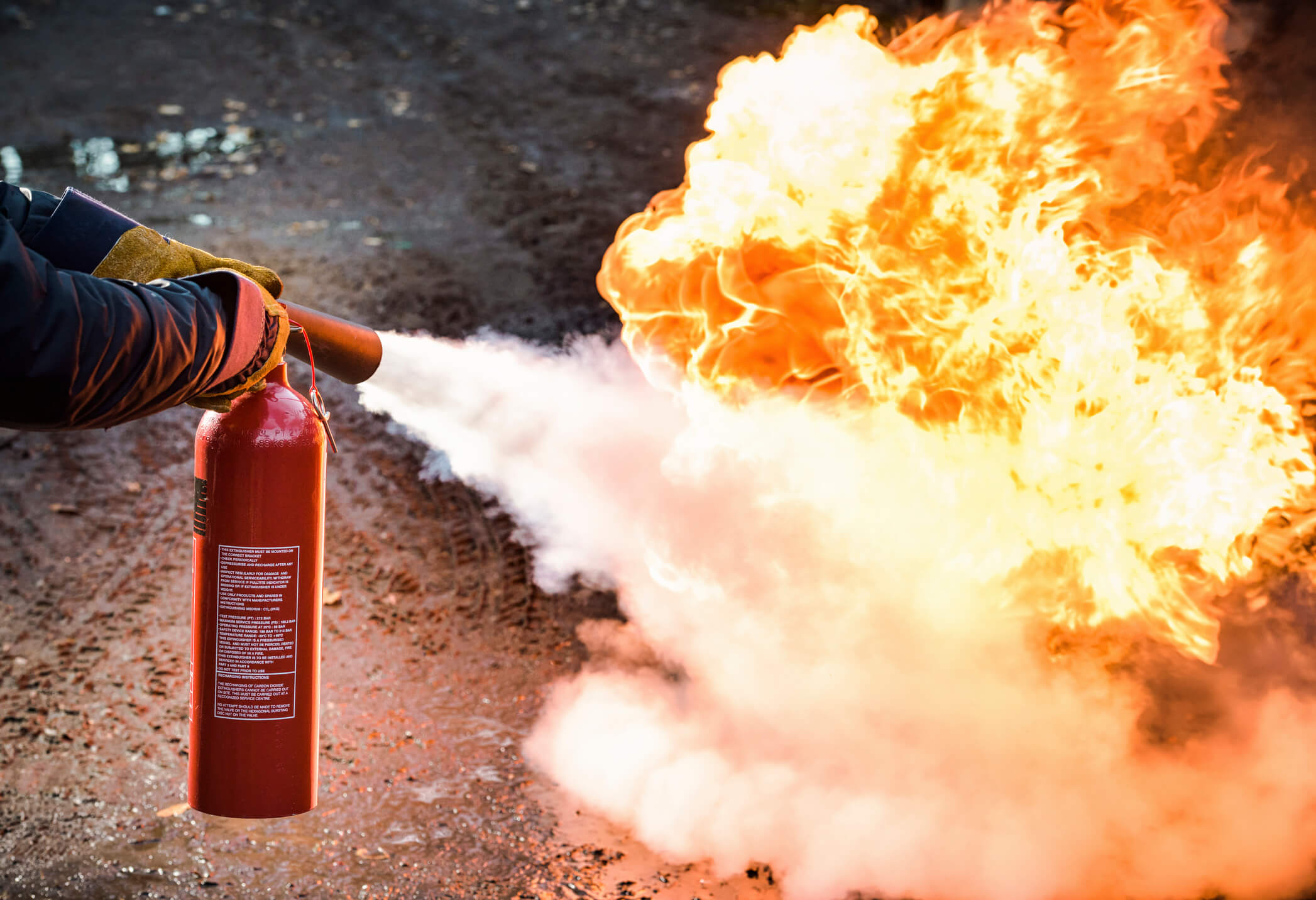 fire extinguisher putting out fire