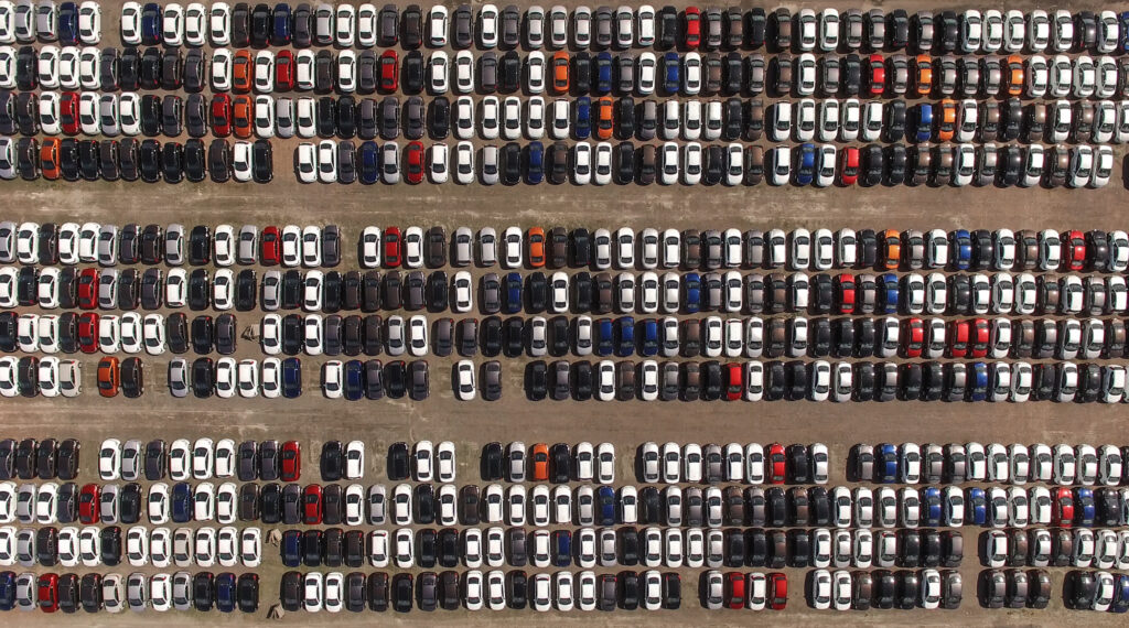 aerial view of cars in a lot