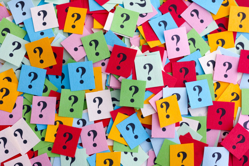 question marks on colorful post its