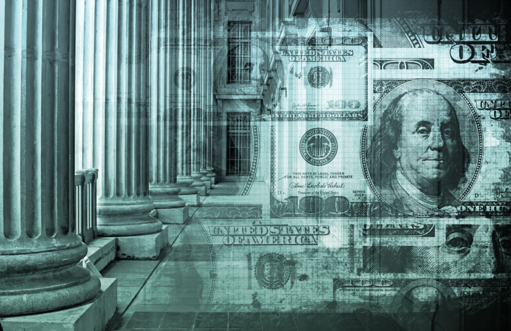 money transposed over building with columns