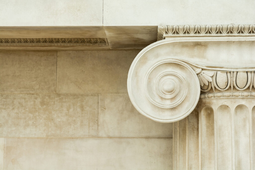 Decorative detail of an ancient Ionic column. close up.