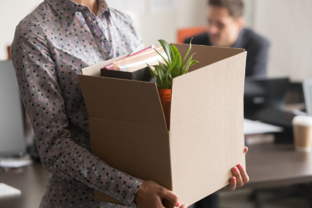 employee with things in box