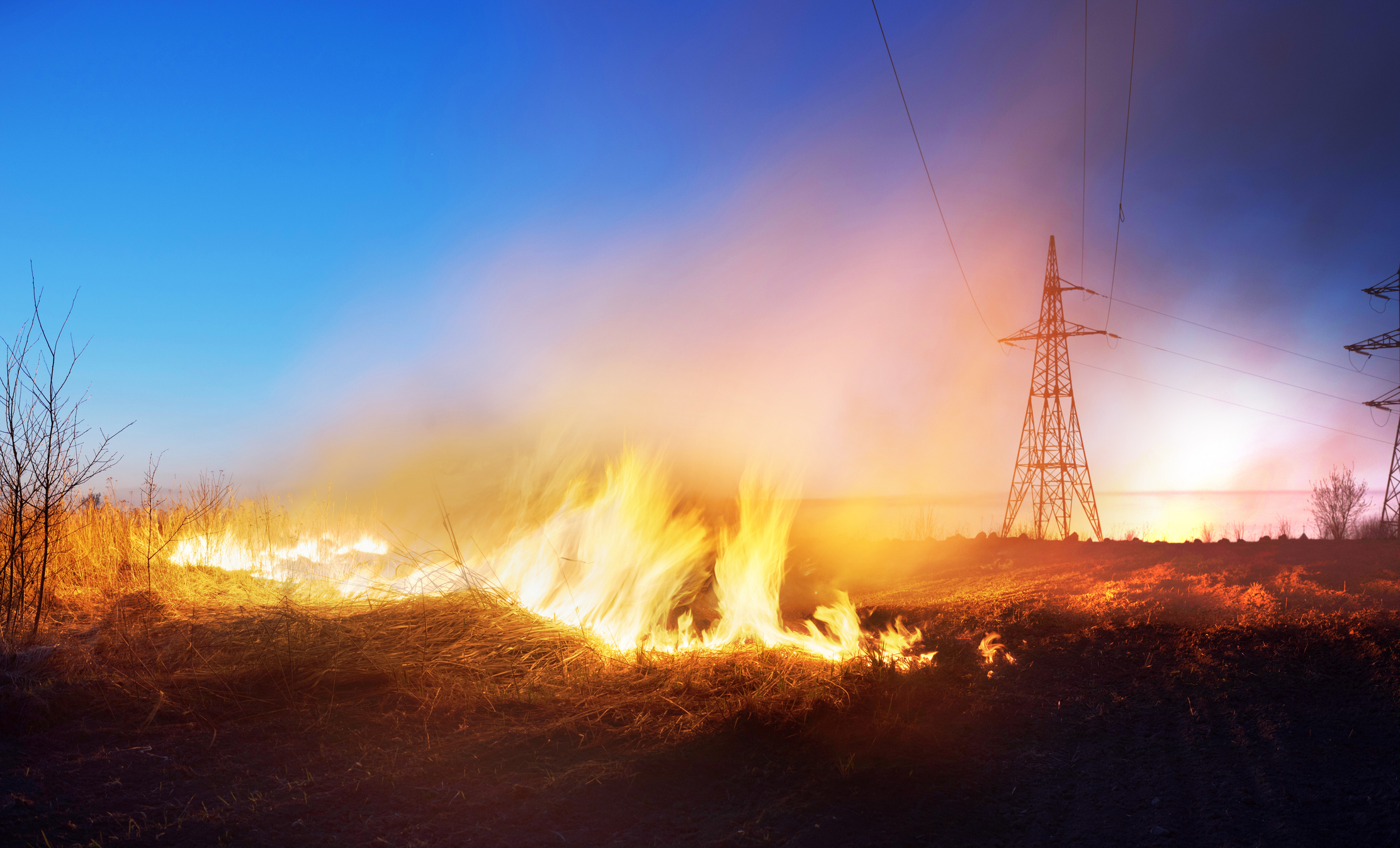 grass fire under powerlines