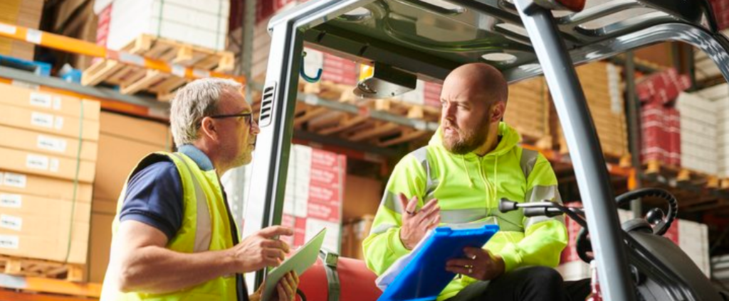 warehouse workers talking
