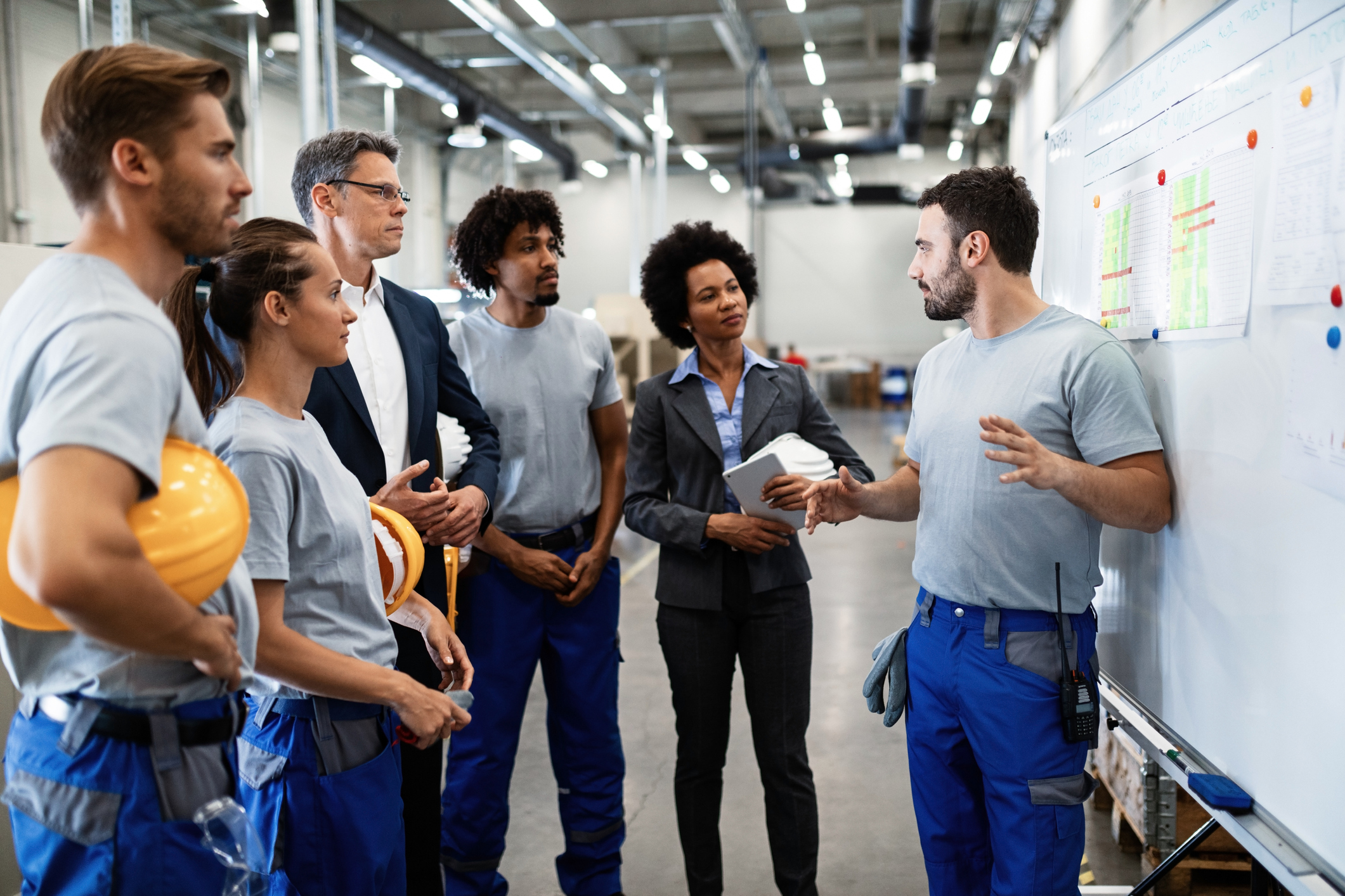 workers listening to presentation